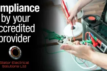 Hands holding electrical testing equipment with text about compliance.