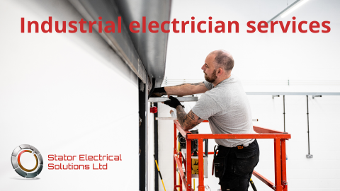 Image of an electrician installing electrics in industrial space