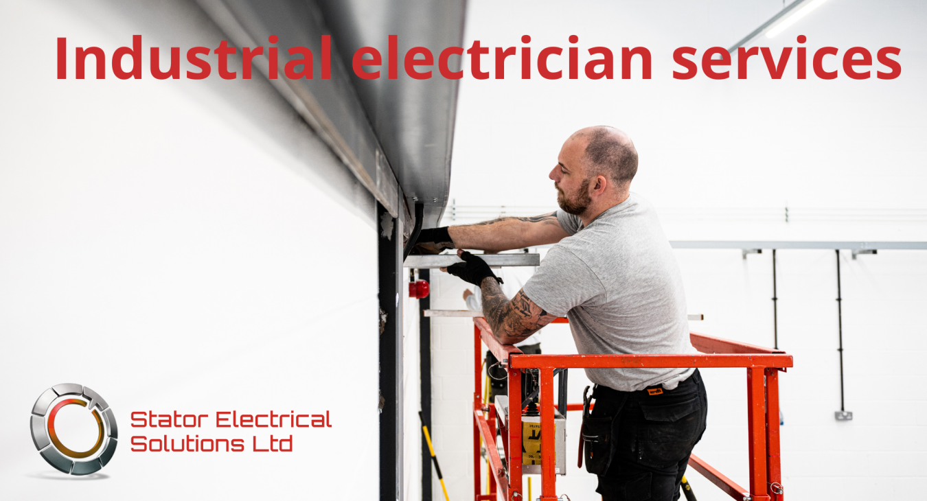 Image of an electrician installing electrics in industrial space